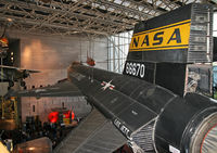 56-6670 - The first aircraft to go beyond the Earth's atmosphere faces the first aircraft to break the sound barrier, the Bell X-1. - by Daniel L. Berek
