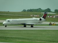 N908XJ @ MCI - Delta Connection taxiing to Terminal from 19R - by Helicopterfriend
