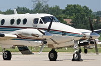 N1560T @ KDPA - BLACK OAK LEASING LLC, Beechcraft King Air 90 N1560T on the ramp at KDPA after arriving from KSLE. - by Mark Kalfas