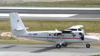 PJ-WIR @ TNCM - Winair PJ-WIR taxing to the active for take off from TNCM - by Daniel Jef