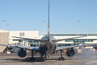 N229UA @ KDEN - United Airlines Boeing 777-222, N229UA pushing back and starting up from B38 KDEN. - by Mark Kalfas