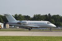 N605RC @ KOSH - CL-600-2B16 - by Mark Pasqualino