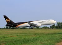 N314UP @ KPHL - UPS B767 'Heavy' touching down on 9R at PHL. - by T.P.McManus