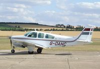 G-OAHC @ EGSU - Beechcraft F33C Bonanza at Duxford airfield - by Ingo Warnecke