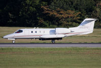 N62PG @ ORF - Phoenix Air's 1977 Gates Learjet 36A N62PG Phoenix 2 rolling out on RWY 5 after arrival from Cartersville (KVPC). Note what it's carrying underneath. - by Dean Heald
