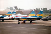 108 @ EGVA - MiG-29A Fulcrum of the Ukranian Falcons display team on the flight-line at the 1997 Intnl Air Tattoo at RAF Fairford. - by Peter Nicholson