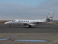 N475HC @ KAPC - Potomac Street Partners (Centennial, CO) 1983 Cessna 550 turning onto Napa bizjet ramp on arrival from KAPA (Centennial Airport, Denver, CO) - note evidence of rare October rainstorm - by Steve Nation