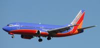 N694SW @ ONT - On final to runway 26R - by Helicopterfriend