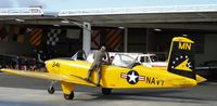 N341MN @ SEE - Pilot assisting passenger with gear and getting ready to fly a four plane formation practice - by Helicopterfriend