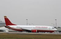 N742VA @ KMKE - Boeing 737-400 - by Mark Pasqualino