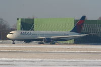 N189DN @ EGCC - Delta B767 taxying to RW05L - by Chris Hall