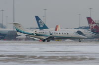 G-IZIP @ EGCC - Premiair Business Aviation Learjet 45 landing on RW05L - by Chris Hall