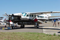 N171CC @ KLAL - Sad demise for this great looking Caravan - when storms passed though Lakeland at 2011 Sun n Fun - by Terry Fletcher