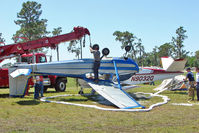 N5627A @ KLAL - 1956 Cessna 172, c/n: 28227 storm damaged in the Camping area at 2011 Sun n Fun - by Terry Fletcher