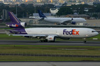 N588FE @ YSSY - down onto 16R - by Bill Mallinson