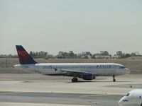 N309US @ PHX - Taxiing for take off at runway 25R - by Helicopterfriend