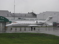 N9CU @ KOSH - A rainy day ramp scene at Basler FBO - by steveowen