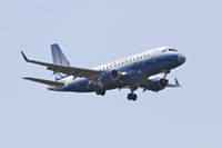 N856RW @ KORD - Shuttle America/United Express Embraer ERJ 170-100 SE, TCF3453 arriving from KLGA, RWY 10 approach KORD. - by Mark Kalfas