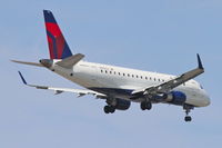 N630CZ @ KORD - Compass Airlines/Delta Connection Embraer ERJ 170-200 LR, CPZ5697 arriving from KMSP, RWY 10 approach KORD. - by Mark Kalfas