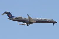 N703SK @ KORD - SkyWest/United Express Bombardier CL-600-2C10,
SKW5499 arriving from KBIL, RWY 10 approach KORD. - by Mark Kalfas