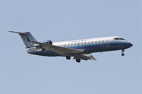 N975SW @ KORD - SkyWest/United Express Bombardier CL-600-2B19, SKW5346 arriving from KEAU, on approach RWY 10 KORD. - by Mark Kalfas