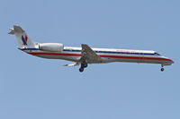 N618AE @ KORD - American Eagle Embraer EMB-145LR, EGF4346 arriving from KROC, RWY 10 approach KORD. - by Mark Kalfas