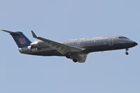 N954SW @ KORD - SkyWest/United Express Bombardier CL-600-2B19, SKW6520 arriving from KMBS, RWY 10 approach KORD. - by Mark Kalfas