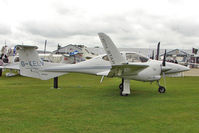 G-KELV @ EGBK - 2005 Diamond DA42, c/n: 42.051 exhibited at 2011 AeroExpo at Sywell - by Terry Fletcher