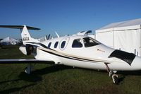 N94GA @ LAL - Eclipse damaged but flyable after a small plane was flipped on top of it the day before during a strong thunderstorm - by Florida Metal