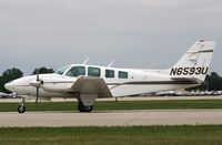 N6593U @ KOSH - Beech 58 - by Mark Pasqualino