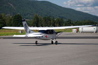 LN-LTH @ ENNO - Cessna 182E Skylane taxying on the platform of Notodden airfield, Norway. Note the artwork on its tail. - by Henk van Capelle