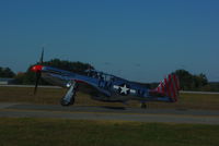 N251MX @ MHT - Collings Foundation North American P-51C Mustang trainer on taxiway hotel taxiing to runway 35 at MHT. - by John Newall