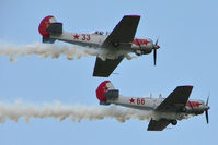 G-YAKZ @ EGNA - Two of the four Yak Display team arriving  at the 2011 Merlin Pageant held at Hucknall Airfield - by Terry Fletcher