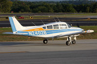 N24028 @ PDK - 1977 Beechcraft C24R Sierra 200 N24028 taxiing to RWY 2R for departure. - by Dean Heald