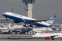 N783UA @ LAX - United Airlines N783UA (FLT UAL877) departing RWY 25R en route to Shanghai Pudong Int'l (ZSPD/PVG). - by Dean Heald