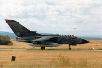 ZA411 @ EGQS - Tornado GR.1 of 617 Squadron awaiting clearance to join Runway 23 at RAF Lossiemouth in September 1994. - by Peter Nicholson