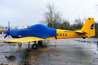 G-BWXA @ EGBG - ex Babcock Defence Services T-67 in storage at Leicester - by Chris Hall