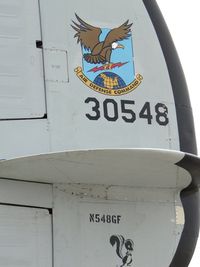 N548GF @ CNO - EC-121T's starboard tail fin, showing military designation, military number, N Number, and a little skunk (Maybe a little stinker) - by Helicopterfriend