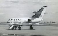 VH-BIZ @ YMEN - This image was scanned from a b&w print taken some time in the early 1960's at Essendon. This was the first business jet in Australia and the only example of the Falcon 20CC built, with dual wheels and low pressure tyres for use on unimproved strips. - by red750