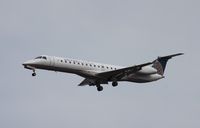 N14977 @ KORD - EMB-145LR - by Mark Pasqualino