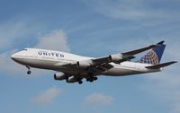 N128UA @ KORD - Boeing 747-400 - by Mark Pasqualino