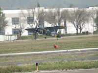 N156LZ @ POC - Lift off from 26R before taxiway Bravo - by Helicopterfriend