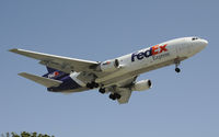 N307FE @ KLAX - Arriving at LAX on 24R - by Todd Royer