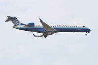 N501MJ @ KORD - Mesa Airlines/United Express Bombardier CL-600-2C10, ASH3760 arriving from Buffalo Niagara Intl/KBUF, RWY 10 approach KORD. - by Mark Kalfas