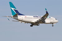 C-FBWS @ KORD - WestJet Boeing 737-7CT, WJA1688 arriving from Vancouver Int'l/CYVR, RWY 14R approach KORD. - by Mark Kalfas