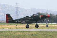 N163BP @ KCNO - P-63 taking off - by Nick Taylor