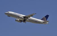 N433UA @ KLAX - Departing LAX on 25R - by Todd Royer