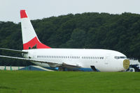 OE-LNN @ EGBP - ex Austrian Airlines B737, only 11 years old and being parted out by ASI at Kemble - by Chris Hall