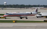N660CL @ KORD - EMB-145LR - by Mark Pasqualino