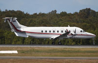 VH-PSK @ YBBN - Queensland Police Service Beechcraft 1900 - by Thomas Ranner